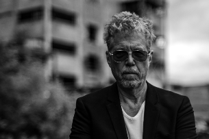 Gary Louris (solo) w/ Ethan Anderson (partially seated)