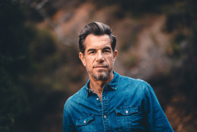 Image of Nick Hexum with Water Tower Image of Nick Hexum with Water Tower